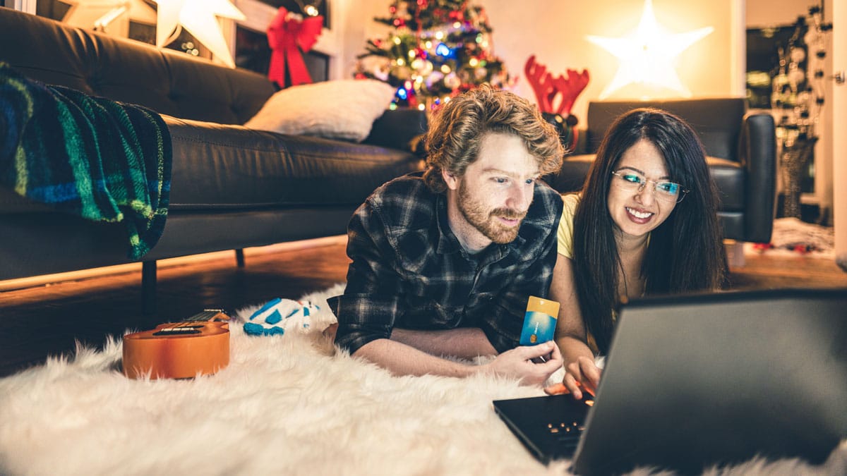 Couple buying holiday presents online