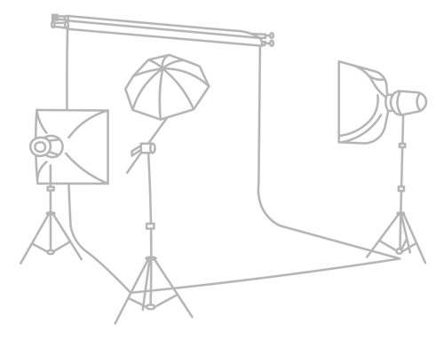 Sketch of a studio setup with lights and backdrop.