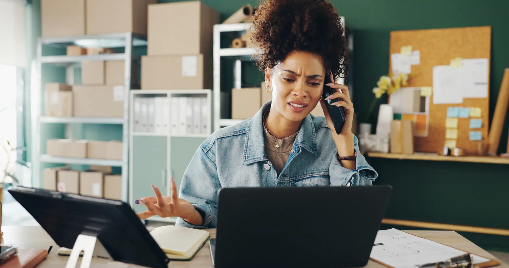 Small business owner reviewing a digital marketing budget on a laptop